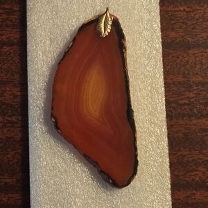 Polished Agate Slice Pendant with Gold‑Tone Leaf Bail – 1.5" × 2.25"